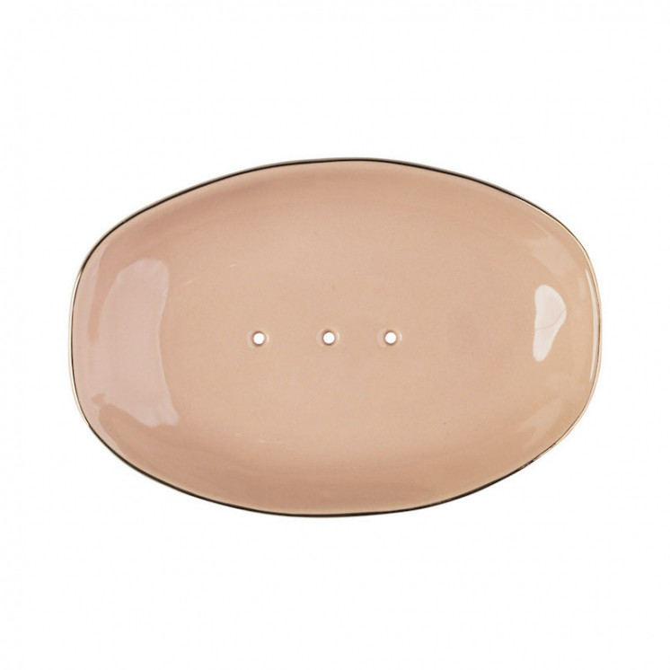 Porte-savon en céramique ovale rose-saumon avec un liseré doré, et 3 trous pour laisser l'eau s'écouler